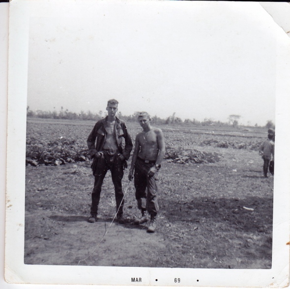 SPC Roger Farley and a friend in Vietnam